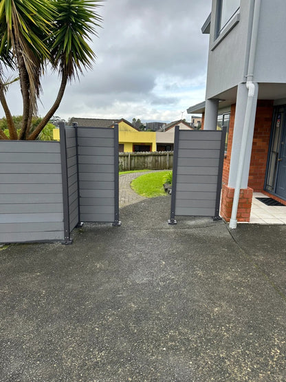 Black Rothnow WPC fence RNWF04 made of composite wood for durable outdoor fencing, shown in a customized size.