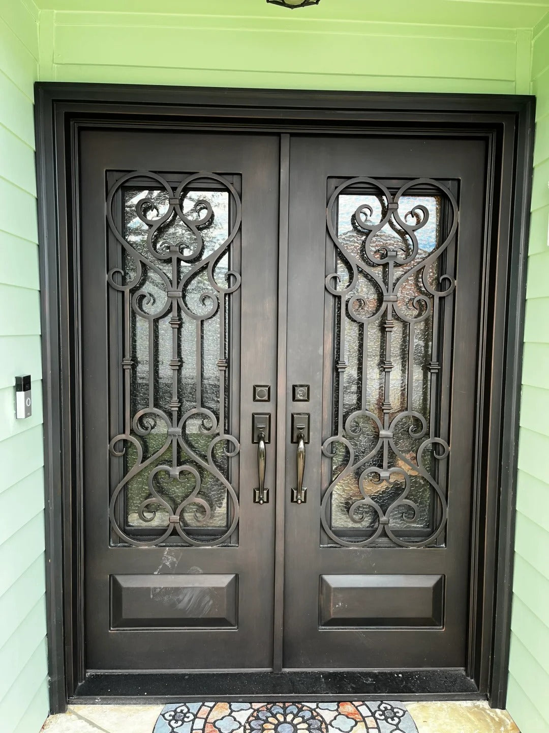 Black Rothnow wrought iron entrance door with intricate design, customized size for a stylish front entryway.