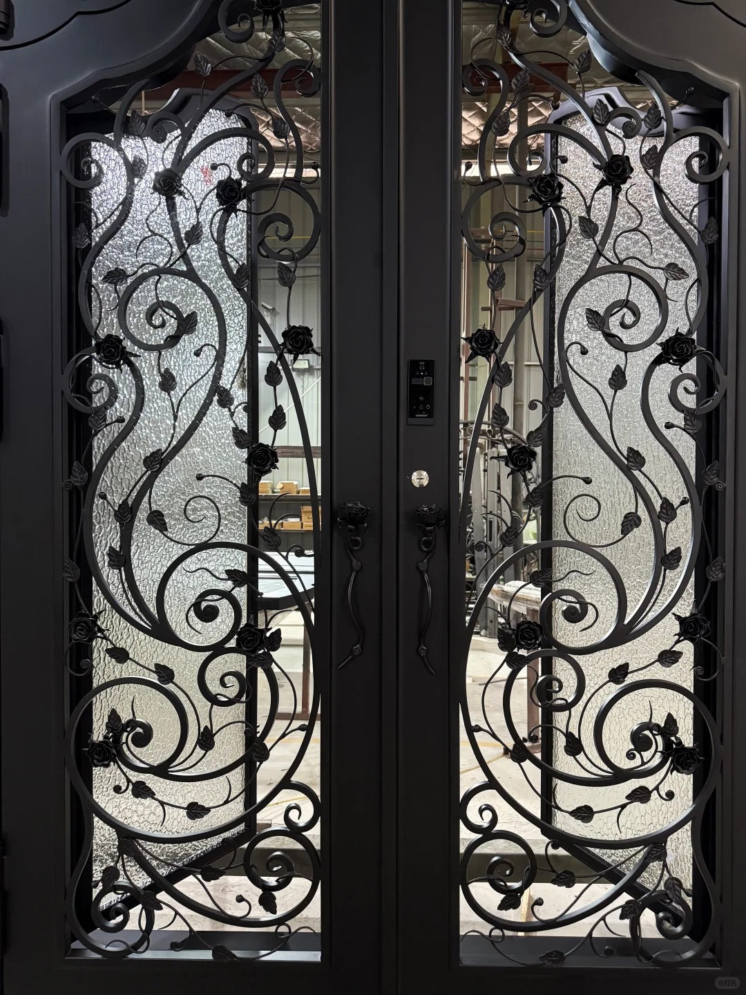 Black Rothnow wrought iron entrance door with intricate design, custom-sized for a stylish and durable front entry.