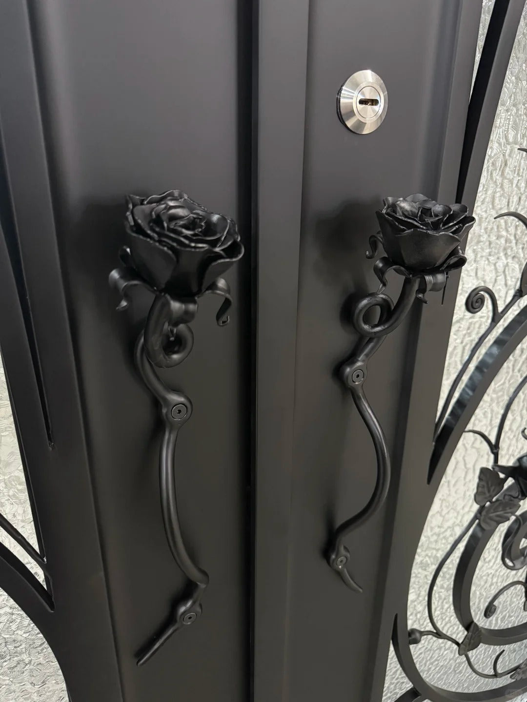 Black Rothnow wrought iron entrance door with custom size and intricate design, ideal for secure and stylish home entry.