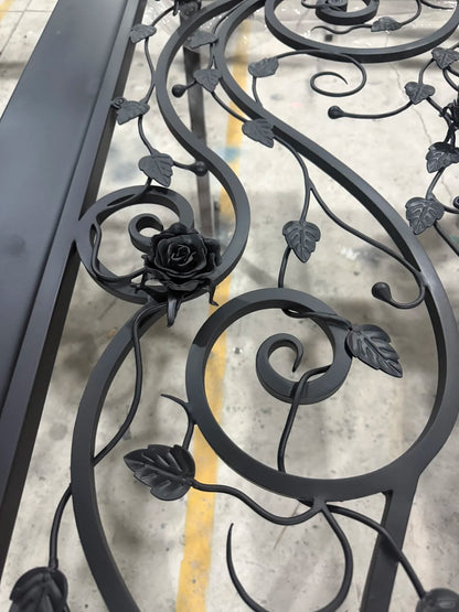 Black Rothnow wrought iron entrance door with intricate design, customized size, and sturdy metal construction for residential entryways.