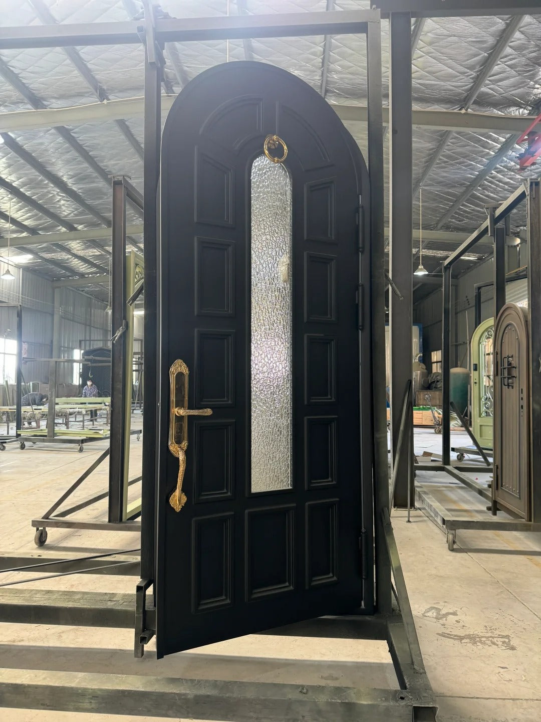 Black Rothnow wrought iron entrance door with custom size and intricate design, ideal for a stylish front entryway.