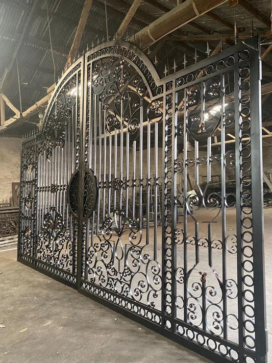 Black Rothnow wrought iron garden gate with decorative scrollwork and custom size, ideal for outdoor security and aesthetic appeal.