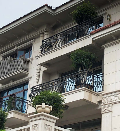 Black Rothnow wrought iron railing and fence with intricate design, custom-sized for outdoor safety and decorative fencing.