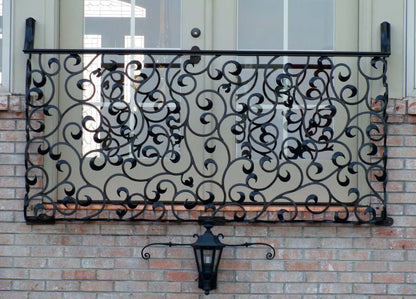 Black Rothnow wrought iron railing with decorative scrollwork, designed for fences and outdoor safety, custom-sized for installation.