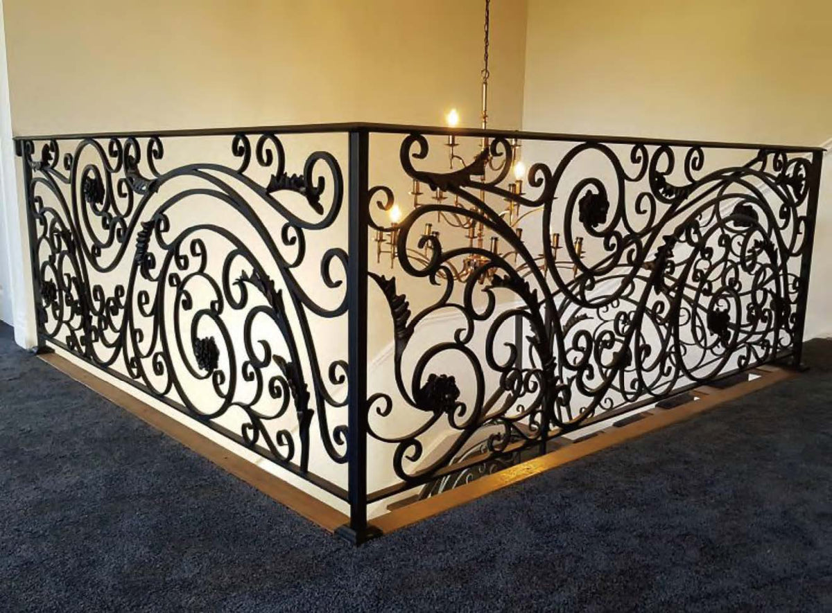 Black Rothnow wrought iron railing with decorative design, custom-sized fencing for outdoor safety and aesthetic enhancement.