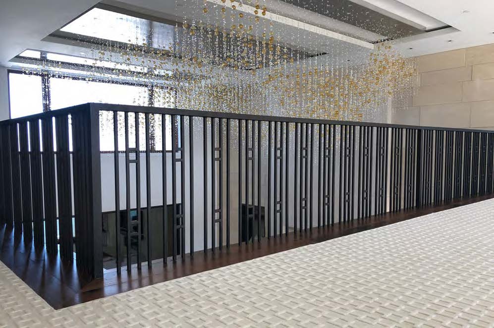 Black Rothnow wrought iron railing with decorative design, custom-sized fence for outdoor safety and aesthetic enhancement.