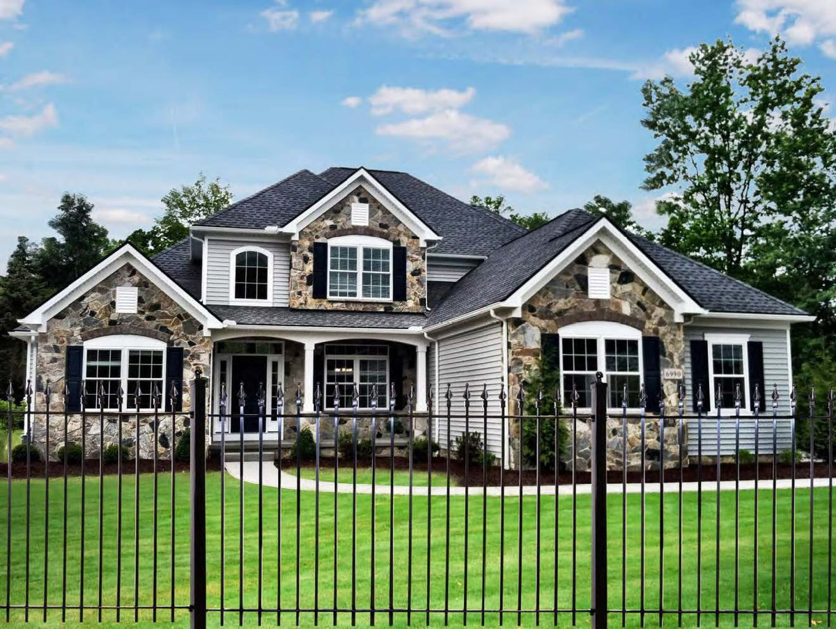Black Rothnow wrought iron railing and fence with intricate design for outdoor security and decorative fencing.