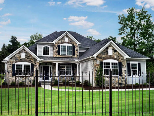 Black Rothnow wrought iron railing and fence with intricate design for outdoor security and decorative fencing.
