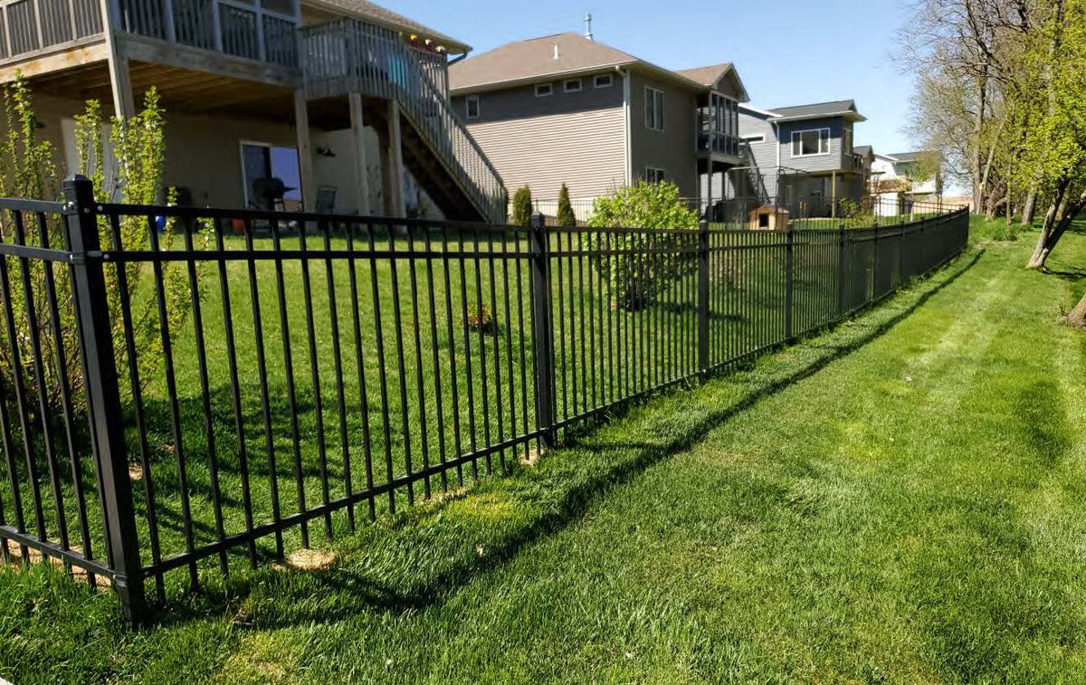 Black Rothnow wrought iron railing and fence with intricate design, customized size, suitable for outdoor security and decorative purposes.