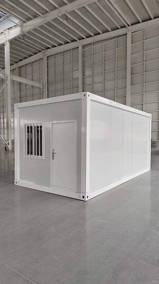 Rothnow® Prefab Steel Structure House RNPH03 in black, flat pack design, with modern exterior and large windows.