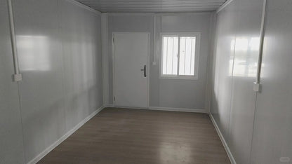 Rothnow Prefab House RNPH03 steel structure building in black, flat pack modular house with modern design, shown from front view.