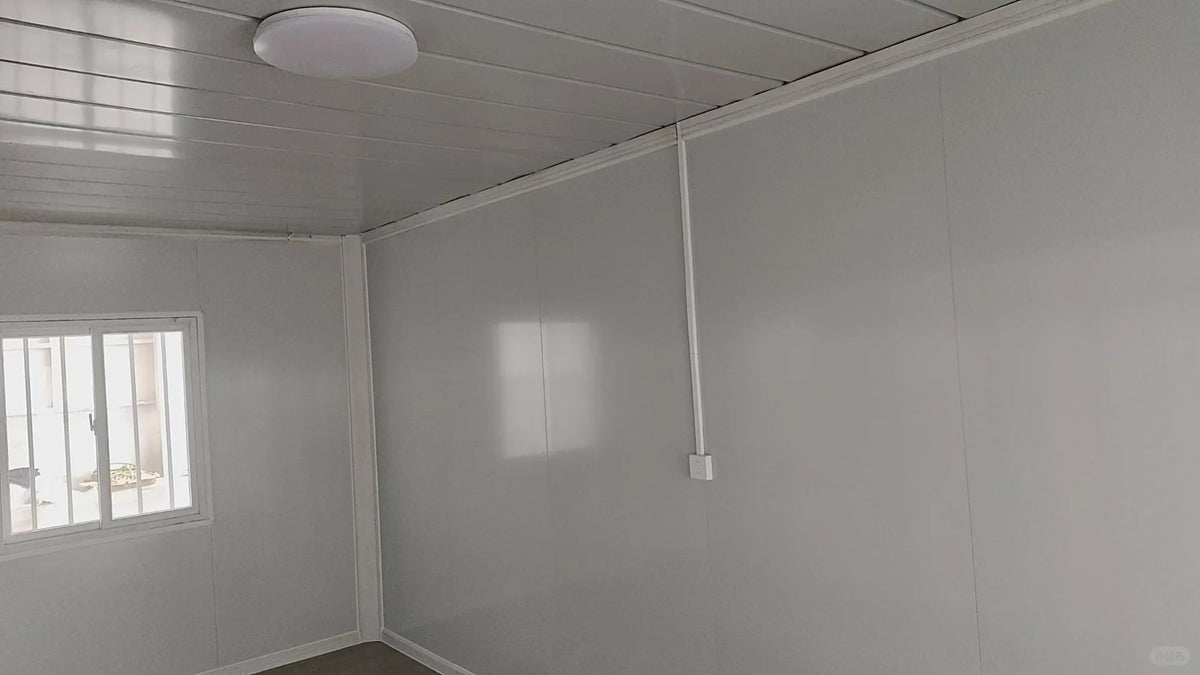 Black Rothnow Prefab House RNPH03 flat pack steel structure building with modern design, compact and easy to assemble.