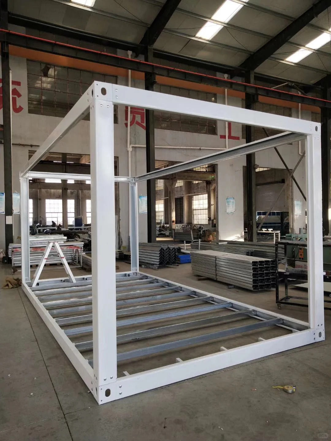 Black Rothnow Prefab House RNPH04 flat pack steel structure building, showing the assembled modern modular house design.