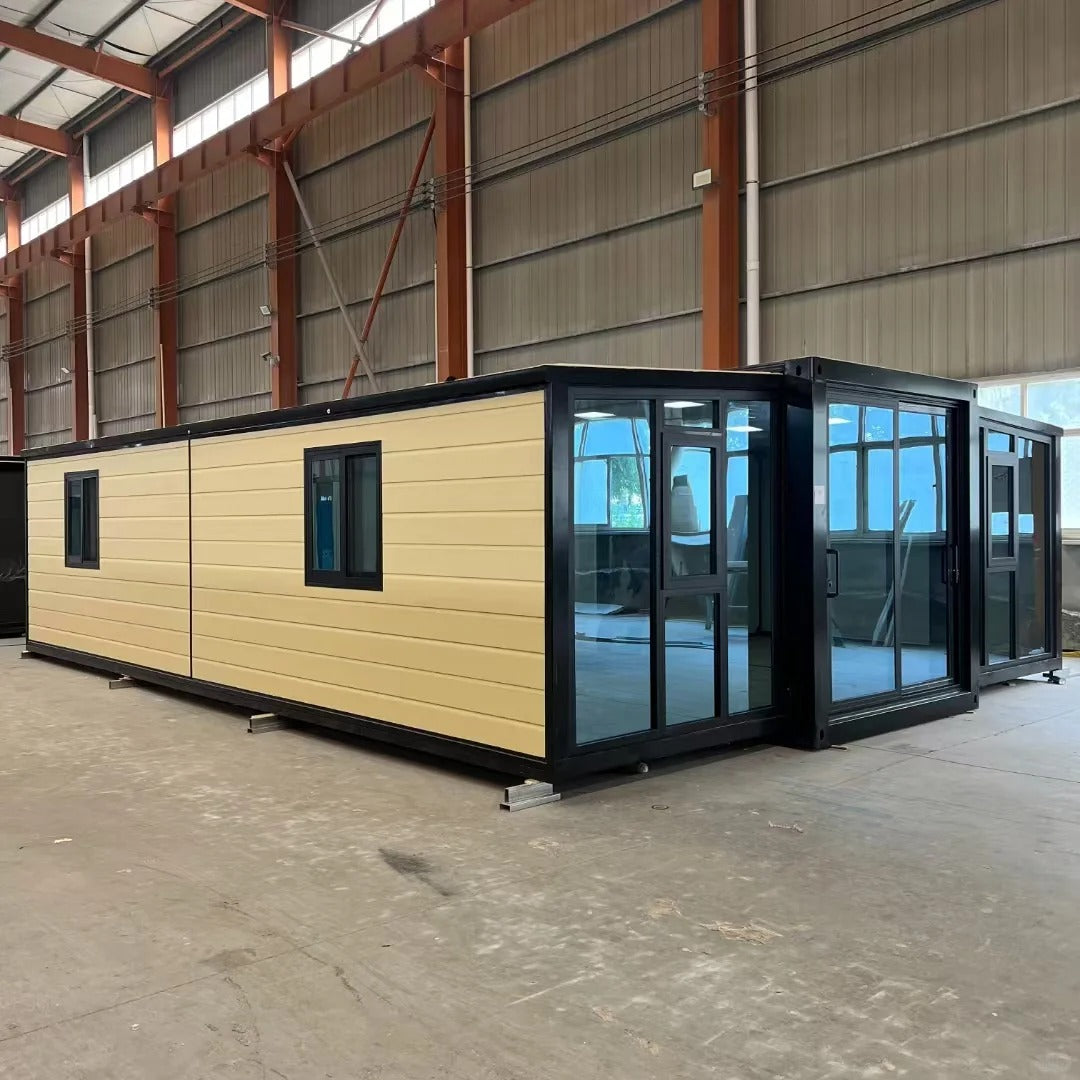 Black Rothnow Prefab House RNPH07-Expandable House made of steel structure, shown with modern design and spacious exterior.