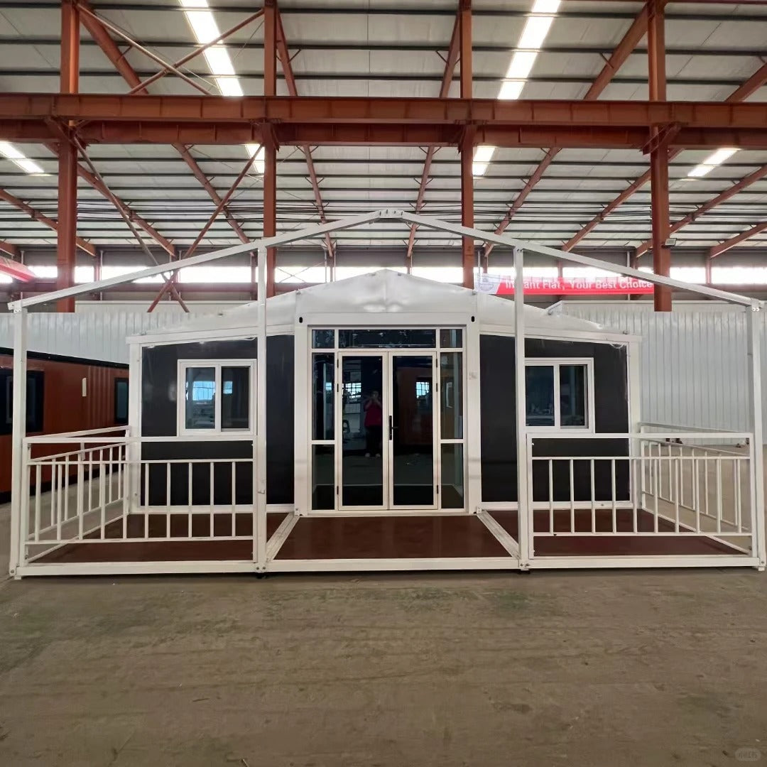 Black Rothnow Prefab House RNPH08 expandable steel structure building with large windows and modern design.